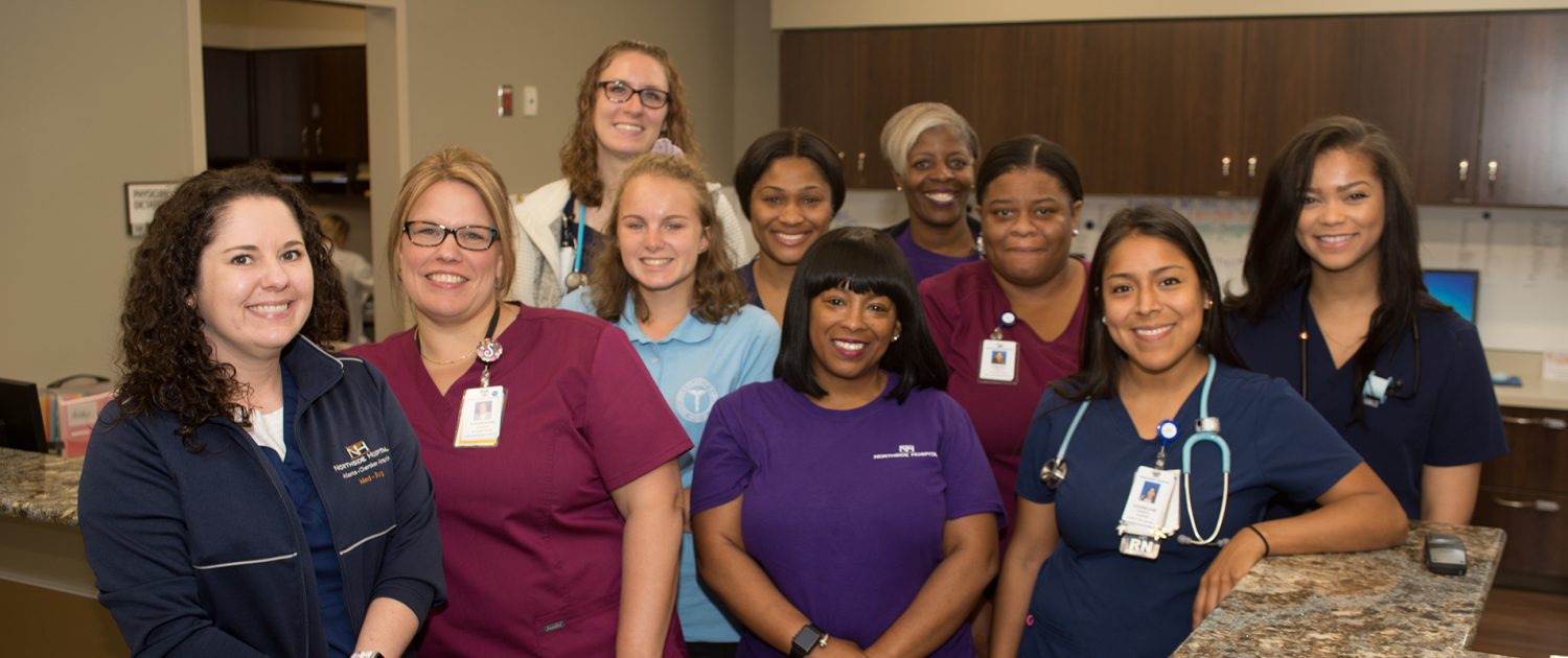 a group of smiling people